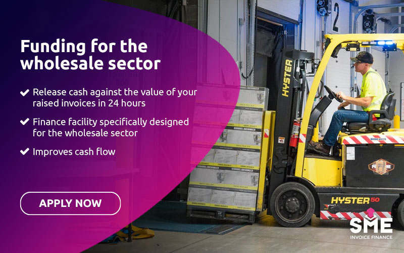 Funding for the wholesale sector - Employee using forklift to move pallets of goods at wholesalers